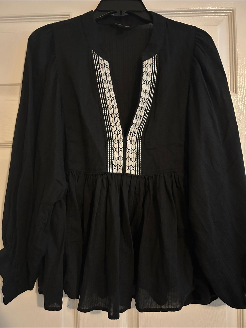 Black Peplum Tunic with White Embroidered V-Neck Placket